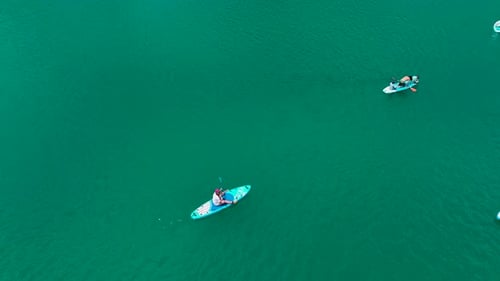 Aerial View Paddleboarding in the Green Canyon People Enjoy the Summer Sun and Relax in Nature