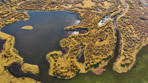 Banff National Park, Canada. A drone view of the river on the field. An aerial landscape