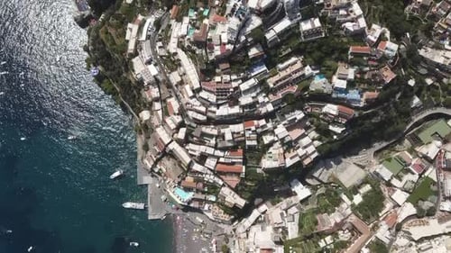 Aerial view of the colorful Positano town with scenic road in the Amalfi coast of Italy