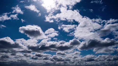 Timelapse of Cumulus Clouds Moves in the Blue Sky
