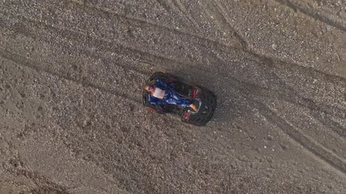 ATV and Waves Aerial of Girl's Ride on Mediterranean Beach