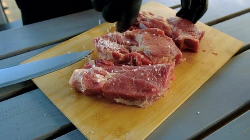 Raw Meat Seasoning on Wooden Cutting Board