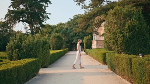 Walking Woman Looking Park Beauty at Weekend Lady Strolling Beautiful Garden