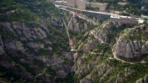 Drone footage of an epic mountain settlement called Montserrat in the foothills of Spain close to