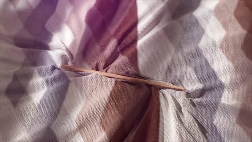 Geometric Pastelcolored Fabric with Soft Texture and Abstract Light Patterns Flowing Gently