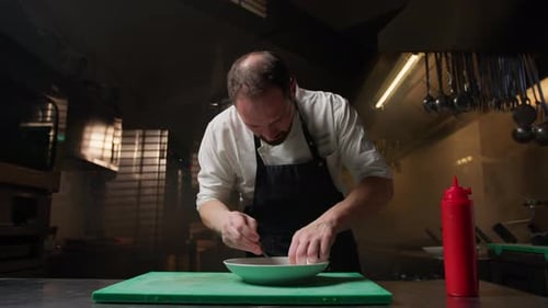 Chef Preparing Food in Commercial Kitchen