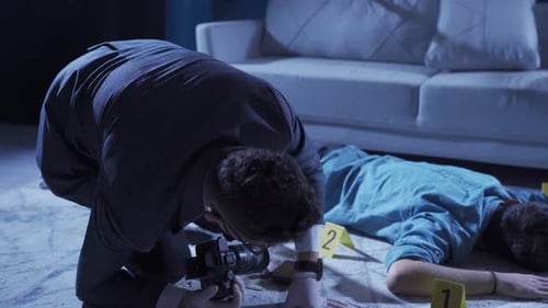 Detective Examines Evidence at Crime Scene