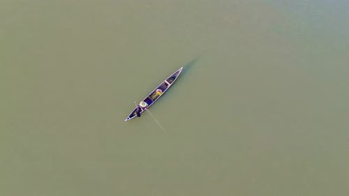 Aerial View of Fishing Boat on Calm Water