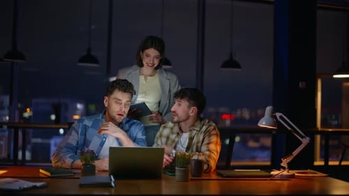 Late Managers Looking Computer Screen Dark Office Overtime Inspired Colleagues