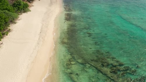 Drone flying over beach in Caribbean