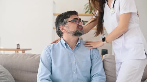 Mature man is visiting female doctor in the clinic
