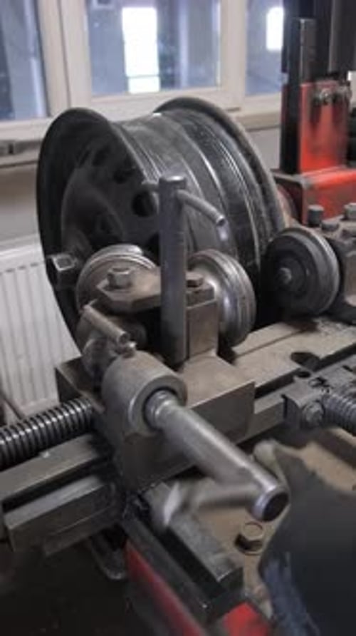 Repair of Steel Wheels From a Car Car Service Services Car Wheel Repair Vertical Video