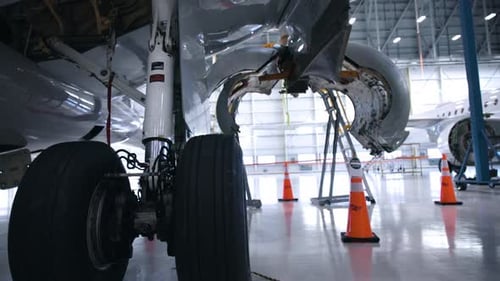 airplane maintenance jet engine being replaced