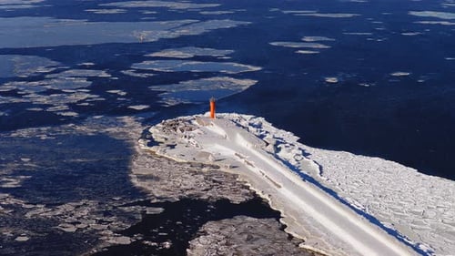 Aerial Winter View of Mangalsala Lighthouse and Ice in Riga Latvia