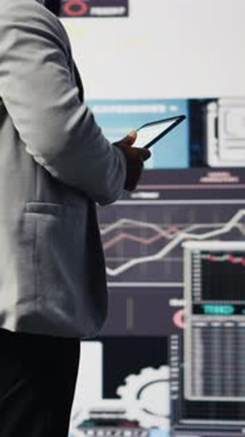 Investor looks at data in finance office