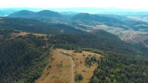 Drone View Zoom Out of Picturesque Landscape in Carpathian Mountains Wide Shot Cloudy Morning