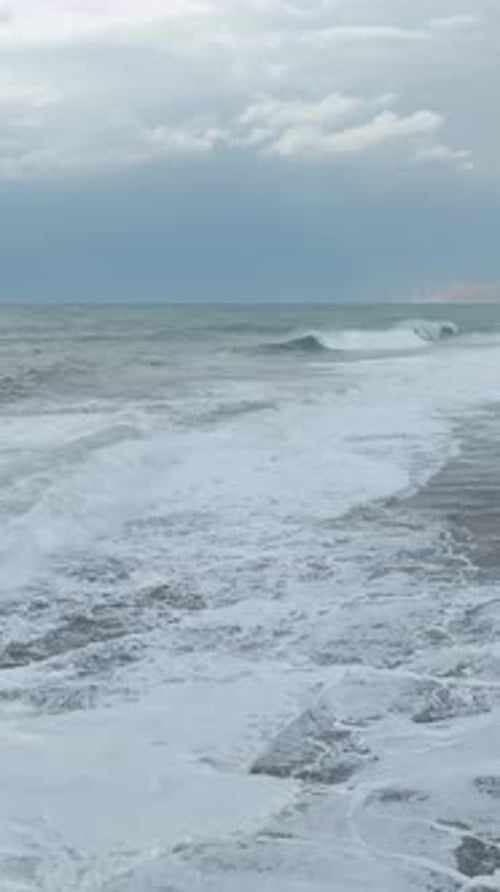 Vertical Video Violent Mediterranean Sea Storm With Crashing Waves and Flying Foam Captured