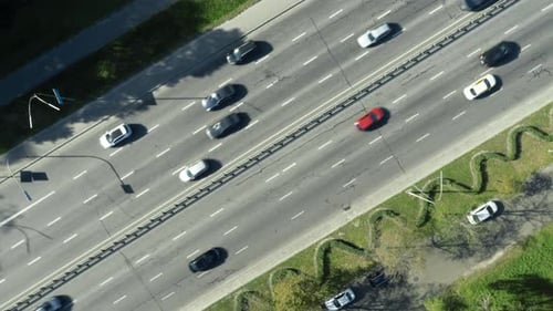 Slow Turning Shot Above of Road with Moving Cars