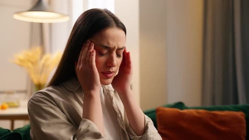 Indoors at Home Caucasian Woman Girl Female Feeling Unwell Bad Headache Pain Ache Migraine Head