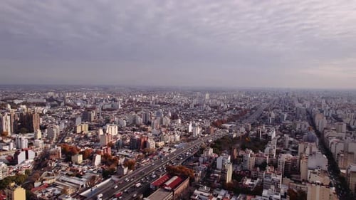 Aerial View of Cityscape with Highway Traffic