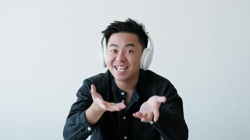 Enthusiastic Young Adult Explaining During a Video Call