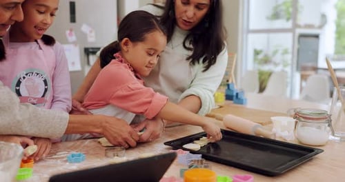 Family Baking Cookies in a Sunny Kitchen