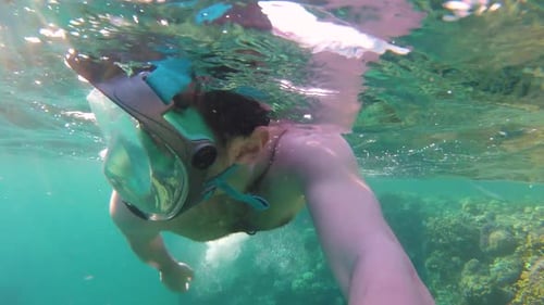 Man Volunteer Wear Snorkeling Mask Dive in Ocean Plastic Bags in Polluted