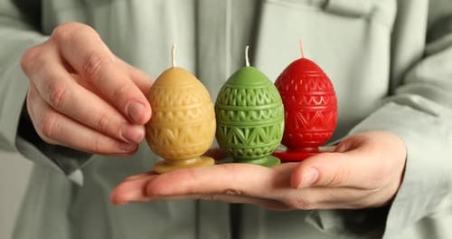 Decorative Egg Candles Held in Palm of Hand