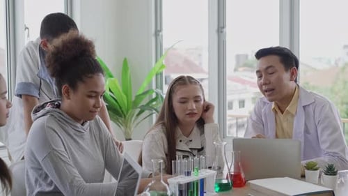 Students and Teacher Working in a Science Classroom