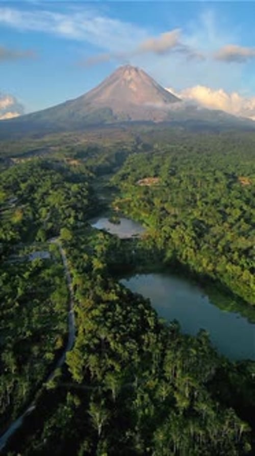 Aerial View of Mount Merapi Volcano and Lush Green Forest