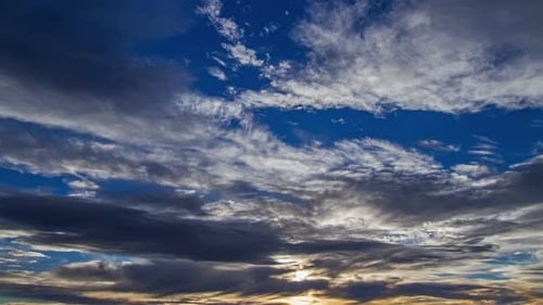 Time Lapse of Dramatic Clouds During Sunset