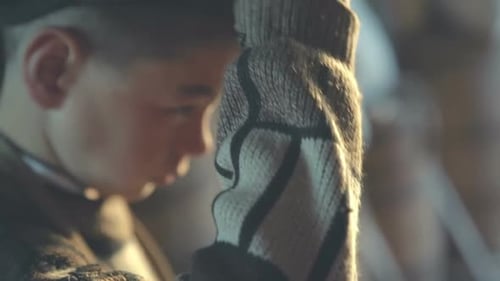 Teenager in an Old Workshop in the Village