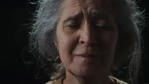 Portrait of Crying Mourning Woman in Advanced Years