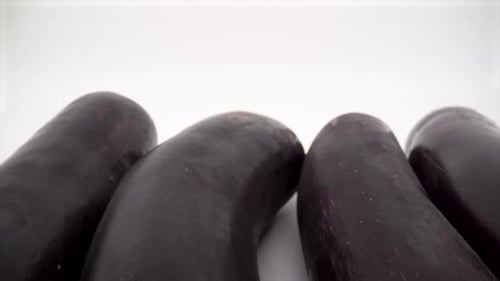 Eggplants close up on white background isolated 4K