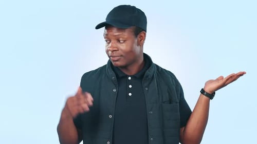 Choice, decision and black man with information for deal, sale or giveaway isolated in a studio blue