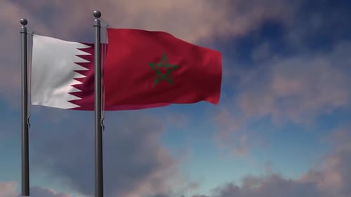 Qatar and Morocco National Flags Waving Against Blue Sky