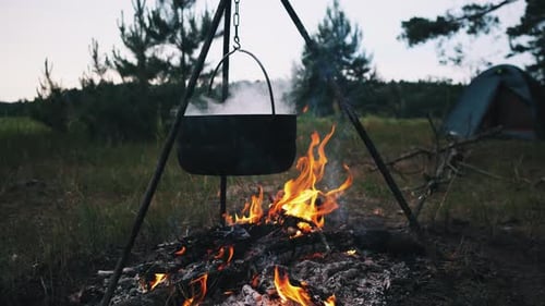 Cooking on Campfire in the Evening