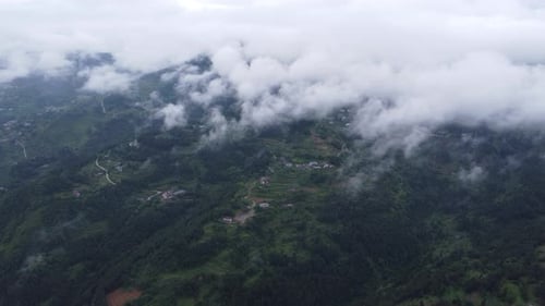 Villages and mountain roads beneath the clouds