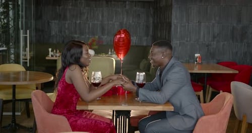 Black Couple Celebtrating Valentine's Day in a Restaurant