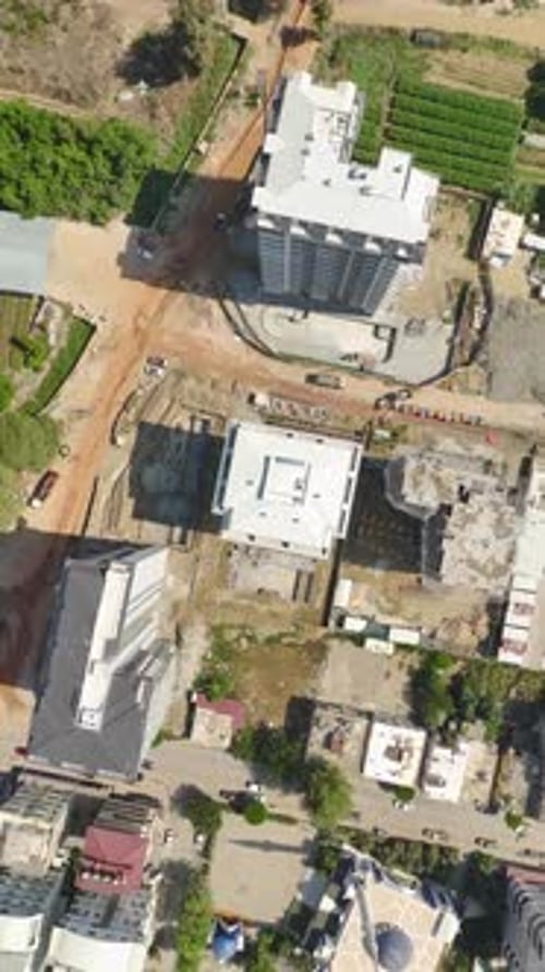 Vertical Video Aerial Roofing View of House Building and Roof Quality Assurance