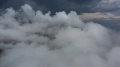 Aerial View of Clouds and Mountains