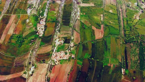 Beautiful Farmland Top Aerial Shot Of Huge Farms India with roads, lake and trees