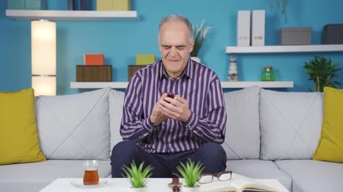 Sad and in love old man gets emotional.