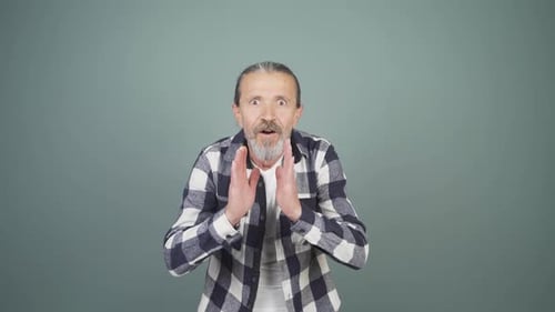 Mature Man Reacts With Surprise and Joy