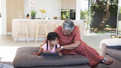 Child and Adult Use Tablet at Home