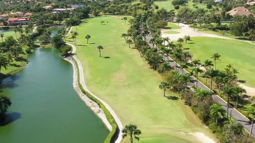 Golf Club Field with Playing Golfers Aerial View