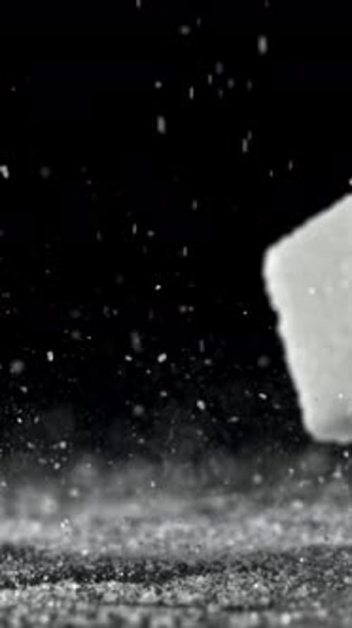 Sugar Cubes Fall on the Table Filmed on a Highspeed Camera at 1000 Fps
