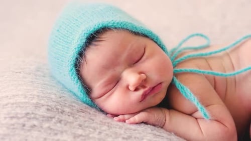 Newborn Infant Sleeping Peacefully