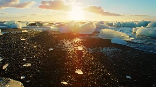 Diamond Beach Iceland Ice Chunks on Black Sand Sunset