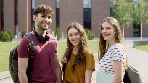 Portrait of group of an university students standing outside the university campus. Shot with RED he